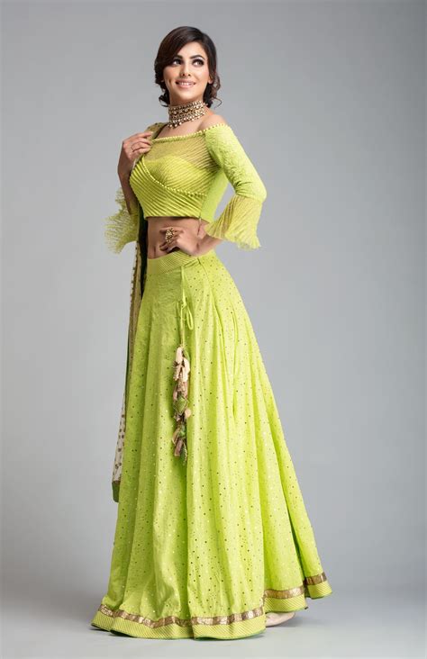 Lime Green Mukaish Lehenga With An Off Shoulder Blouse And Gold Dupatta In Sequin Work Fabric