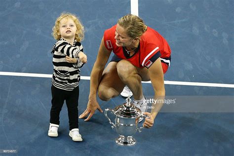 Kim Clijsters Of Belgium And Daughter Jada Pose With The Championship