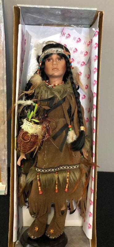 lot 197 native american porcelain doll with basket in tradition dress