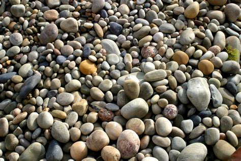 Free At The Beach Pebbles Become Sand 1 Stock Photo