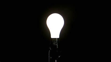 Black and white hd wallpapers widescreen for desktop background px 407.08 kb. Light Bulb Turning on Against a Black Background, HD Stock ...