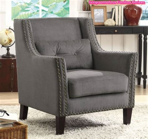 Stocked in grey leather (grade z77). Grey Fabric Accent Chair With Nailhead Trims