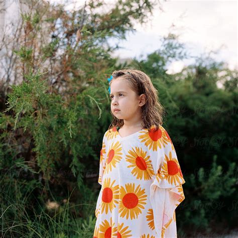 Beautiful Young Girl In A Cover Up Looking Away Del Colaborador De Stocksy Jakob Lagerstedt