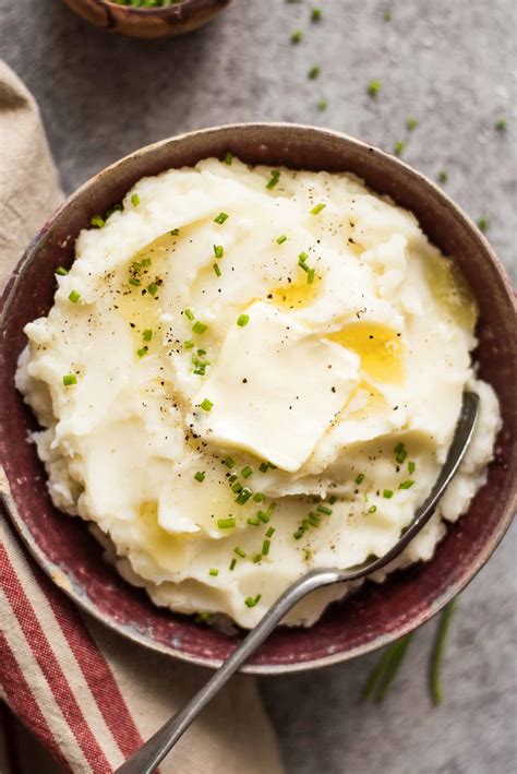 Pour potato mixture into a casserole dish and sprinkle cheddar cheese over the. Slow Cooker Mashed Potatoes Recipe | SimplyRecipes.com