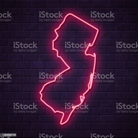 New Jersey Map Glowing Neon Sign On Brick Wall Background Stock