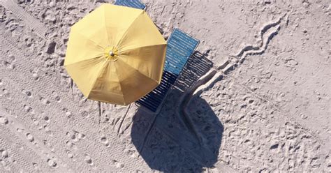 Woman Dies After Being Impaled By Beach Umbrella Blown By Wind