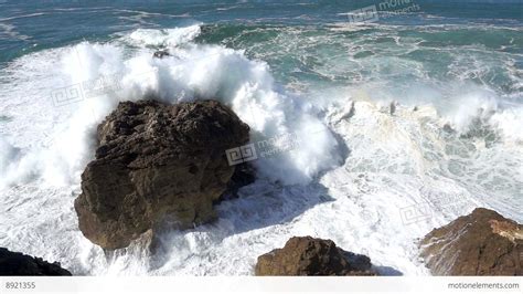 Slow Motion Ocean Waves Breaking On Rocks Stock Video Footage 8921355