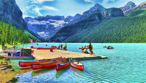 Red Canoes Of Lake Louise Banff National Park Canada Photograph By