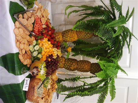 The pineapple has too much liquid in it and the palm tree won't last that long. Luau Party Pineapple Palm Tree Fruit Display | Palm tree ...