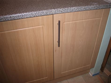 The shelf resembles a shallow drawer that glides out for easy access to items stored in the back of the cabinet. Replacement Kitchen Doors, Kitchen Cupboard Doors