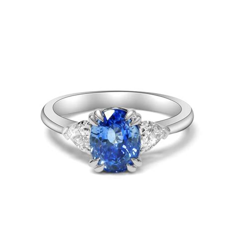 Oval Ceylon Sapphire And Diamond Trilogy Ring Diamonds International