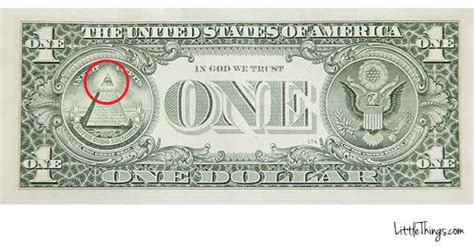 A One Dollar Bill With A Red Marker On It
