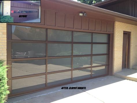 The Clopay Avante Collection Contemporary Glass Garage Door With Bronze