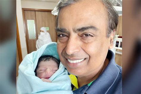 Mukesh Ambani Holding Grandson First Picture Of Shloka Akash Ambanis Baby
