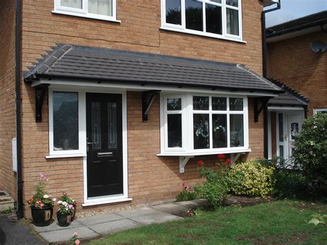 You've come to the right place. Image result for bay window tiled canopy | House canopy ...