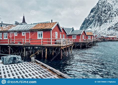 Traditional Red Rorbu Houses In Reine Norway Stock Photo