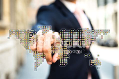 Businessman Pointing A World Map Stock Photo Royalty Free Freeimages