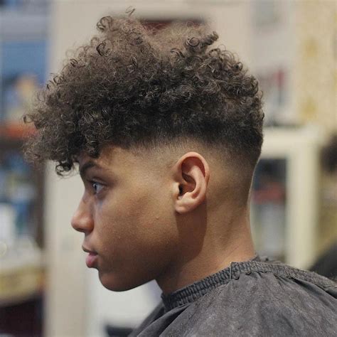Low Fade Haircut With Curly Top Menshairstyles Curly Hair Fade