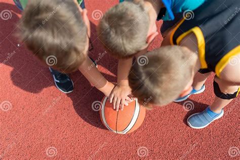 Kids Basketball Team Young Basketball Players Holding Balls On