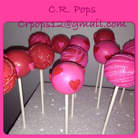 Pink And Red Cake Pops With Hearts On Them