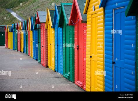 Coloured Beach Huts In Whitby Stock Photo Alamy