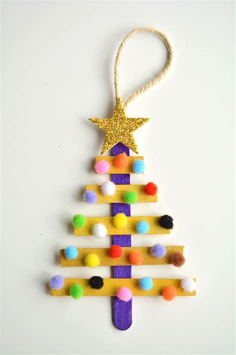 Every year, pool owners purchase these inexpensive (apx. Glittering Popsicle Stick Christmas Trees made with ...