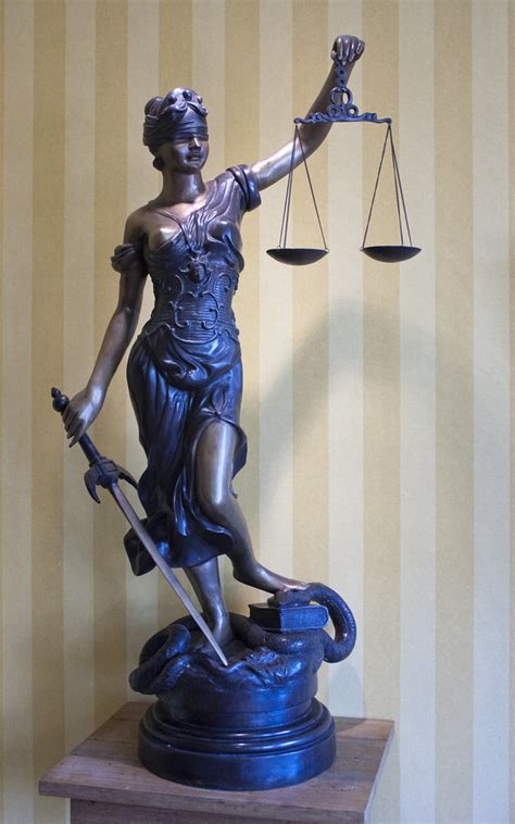 A guide toward living a life of love and justice. Lady Justice | A statue of Lady Justice, with her famous ...