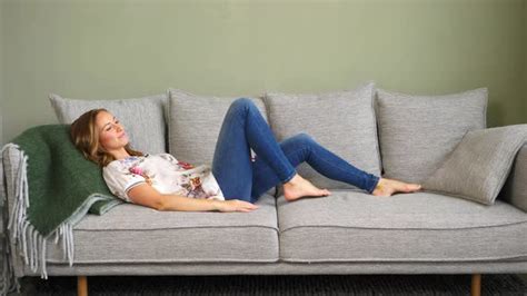 Woman Laying Down On Couch By Sanneberg Videohive
