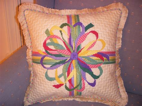 You may wish to pin to secure while sewing the seam. All wrapped up with a bow ! | Needlepoint pillows, Needlepoint stitches