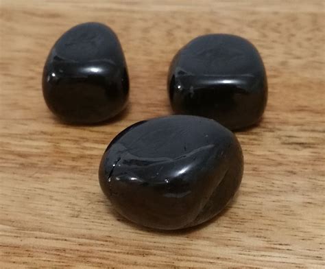 3 Jet Stones Polished And Tumbled Stones The Weight Is 20 Grams By