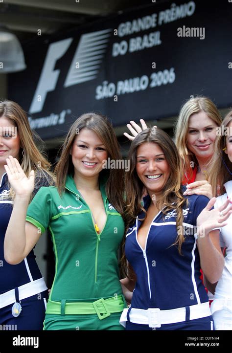 grid girls wave their hands prior to the f1 grand prix of brazil at the racetrack in interlagos