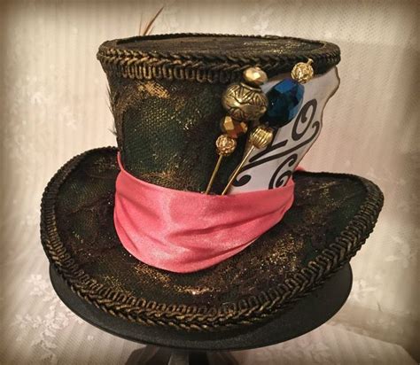 You can either purchase the hat online or handicraft it yourself. MINI Top Hat Tim Burton Mad Hatter hat Alice In Wonderland | Etsy | Tim burton mad hatter, Mad ...