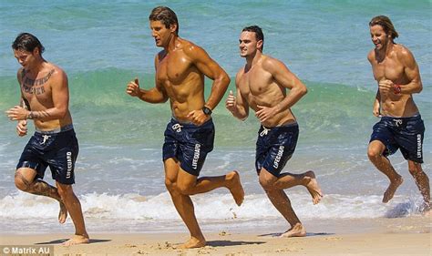 Lifeguard Anthony Carroll Sports A Tan On Bondi Beach For Charity
