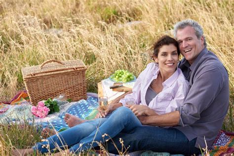 Nothing More Romantic Than A Picnic A Loving Mature Couple Enjoying An Intimate Picnic Together