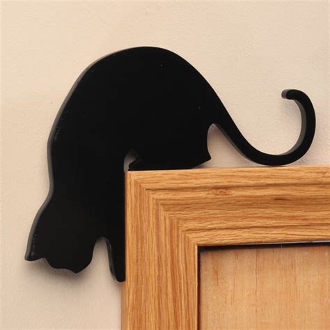 Funny enough that cat when brought to my parents tried to get in their bedroom (open at night!) and they were just very strict with him, that it's not allowed. Cat Draft Stopper - Cat Door Draft Stopper - Miles Kimball