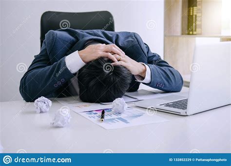 Feeling Stress And Headache Businessman Depressed And Exhausted Stock