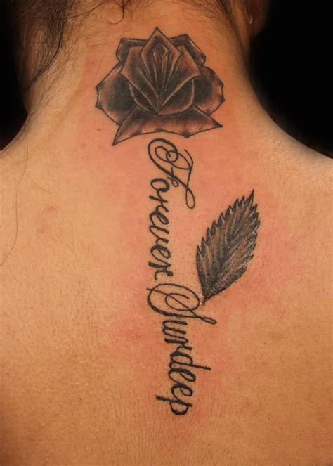 Check out these 71 aweosome flower ink ideas! Black and Grey Rose and Name Tattoo | Paulo Madeira Tattoo ...