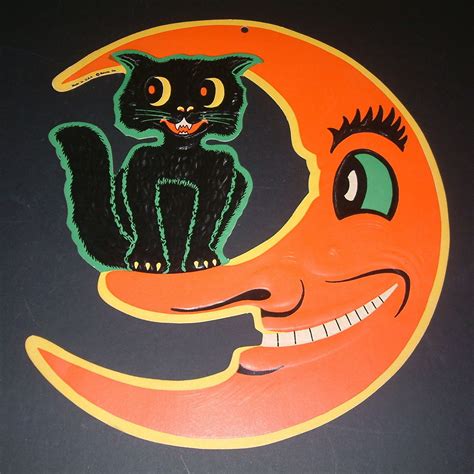 Maybe you would like to learn more about one of these? vintage retro Halloween clip art moon face and black cat ...