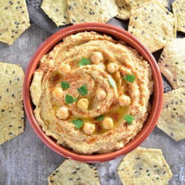 It's made without tahini and flavored with pesto. Creamy Hummus without Tahini - Watch Learn Eat
