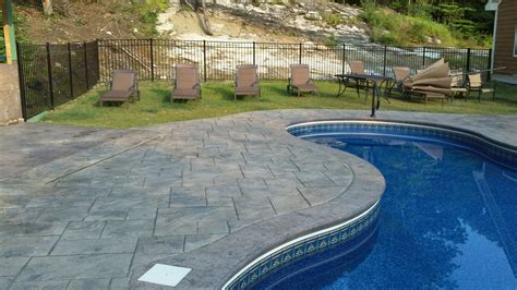 All of the photos you see are real jobs that boss concrete has done. Stamped concrete pool deck and patio. Grand Ashlar slate ...