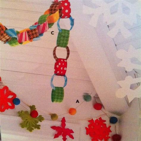 Gently unfold the paper to reveal your snowflake. Felt brightly colored snowflake garland. Make "paper chain" activity for toddler with flannel ...
