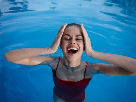 Cheerful Woman Swimming In The Pool Vacation Luxury Bali Stock Photo