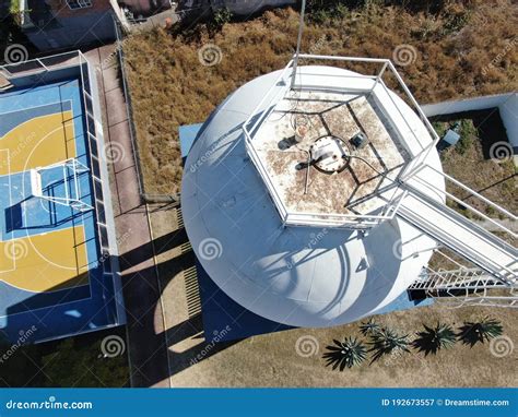 Water Tower From Above Next To A Basketball Court Stock Image Image