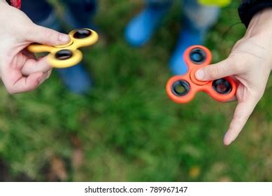 Two Boys Playing Fidget Spinners Outdoor Stock Photo Shutterstock