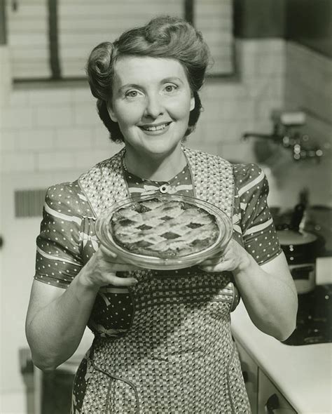 Portrait Of Mature Woman Holding Pie Photograph By George Marks Pixels