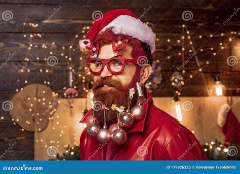 Christmas Or New Year Barber Shop Concept Beard With Bauble Santa In Barbershop Stock Image