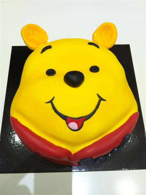 Part of a joint pooh bear and dora the explorer party. Winnie The Pooh, Face Cake. - CakeCentral.com