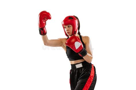 Professional Female Boxer In Boxing Gloves And Helmet Training Isolated