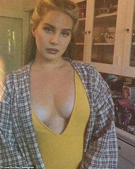 Lana Del Rey Sets Pulses Racing In A Plunging Yellow Top And Jeans As She Poses In Sultry Snaps