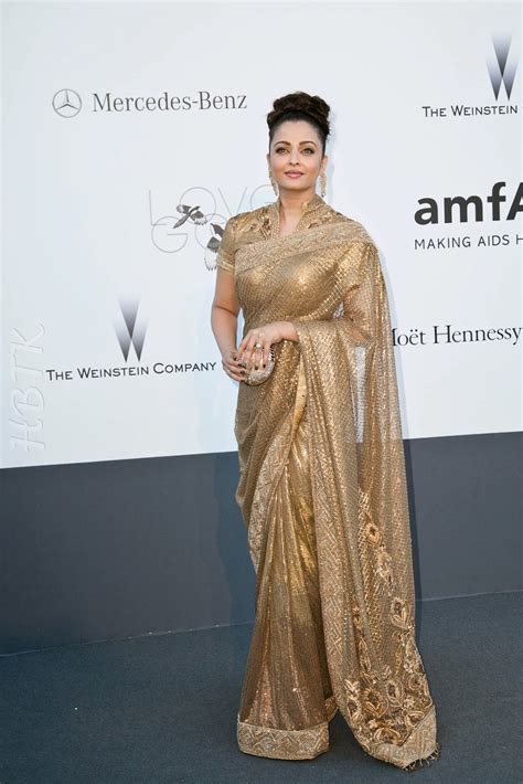 Hbtkollywood Aishwarya Rai In Golden Saree At Amfars 66th Cannes Film